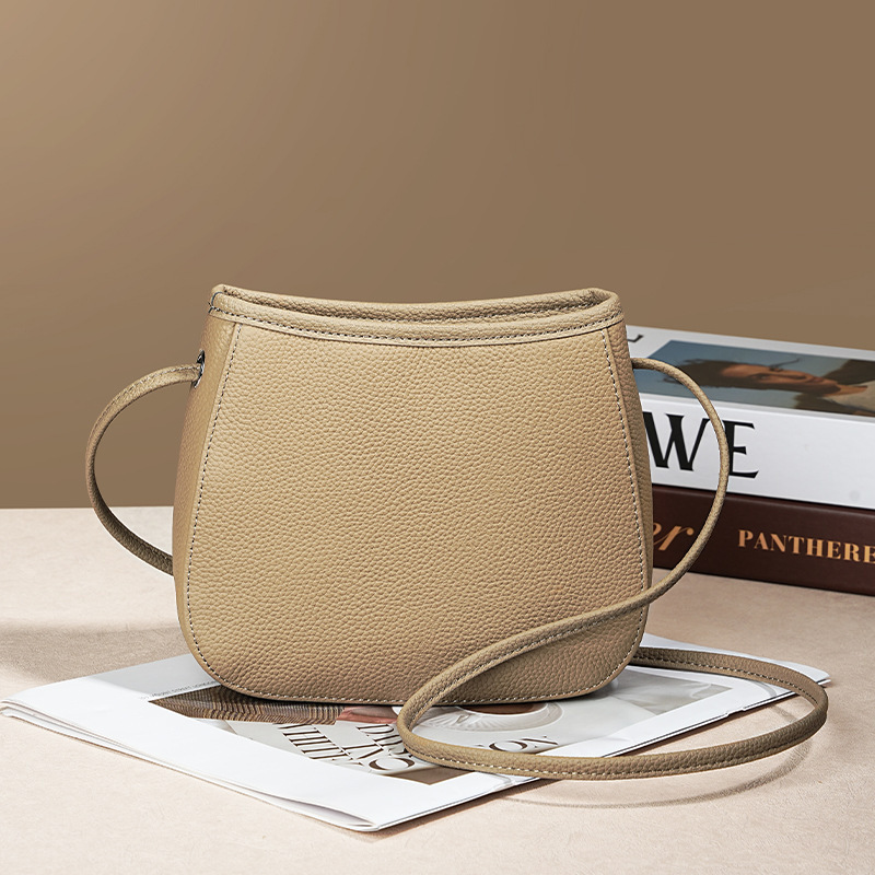 The Artisan Stitch: Genuine Cowhide Versatile Messenger Bag for the Modern Woman
