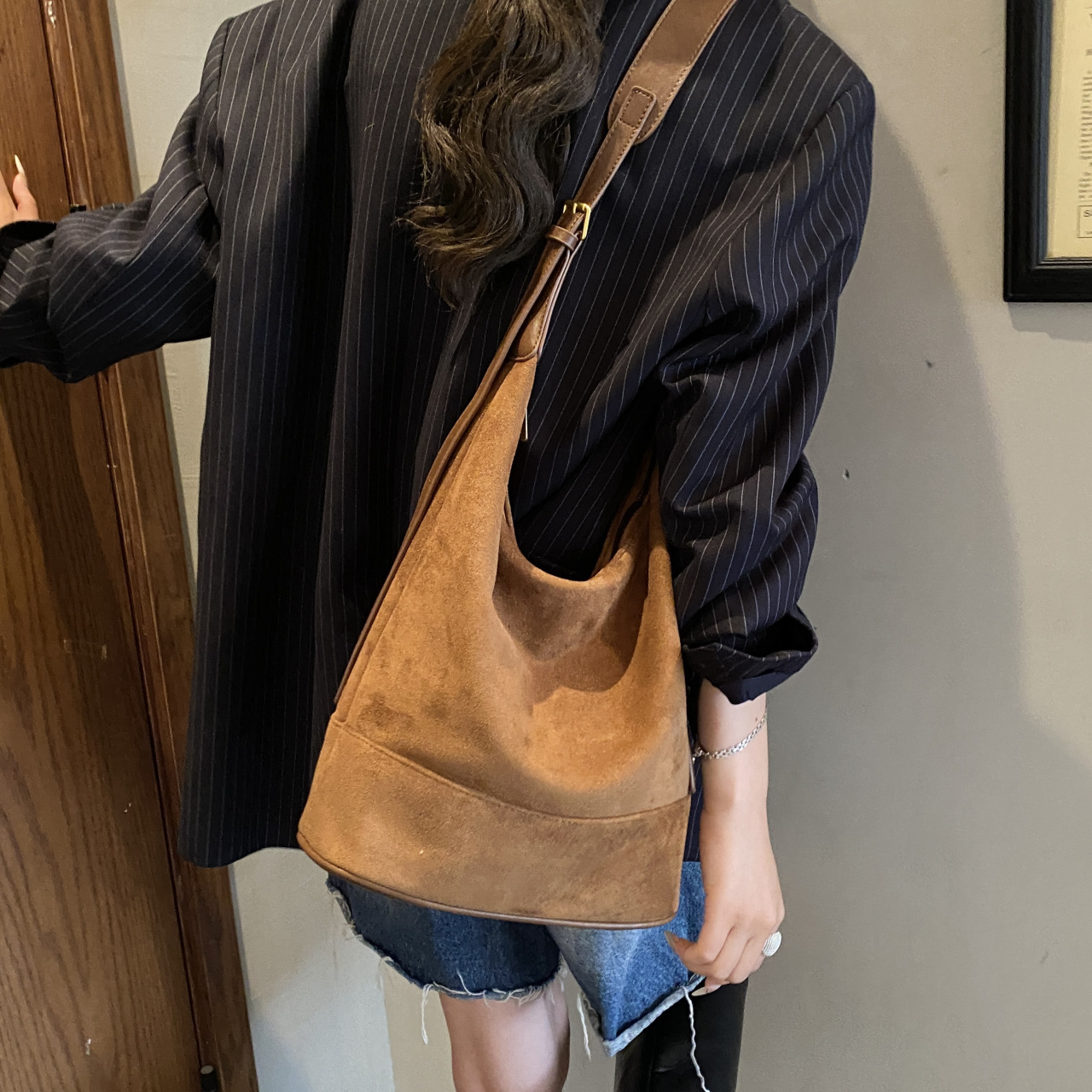 The Uptown Artisan: Vintage Suede Bucket Bag – Your Statement Piece
