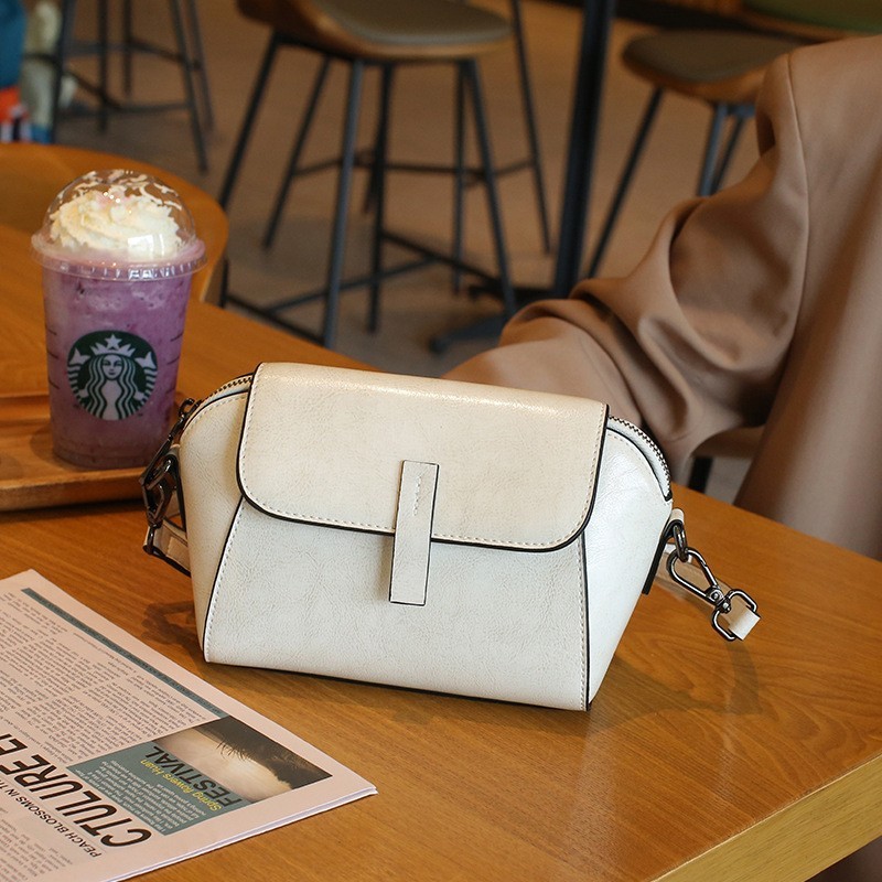 The “Muse” Collection: Chic Oil Wax Cowhide Shell Messenger Bag